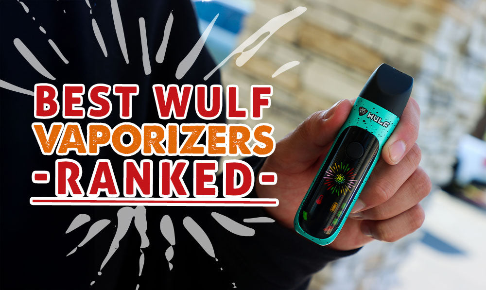 man holding the Wulf Budr Concentrate Vaporizer outside next to office building with text